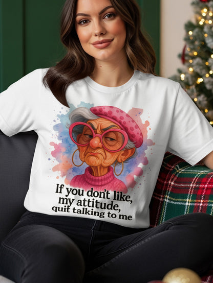 Woman wearing a t-shirt with a grumpy elderly woman graphic and text.