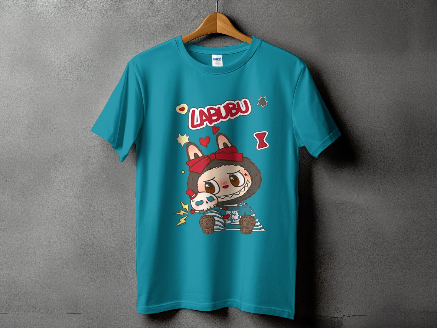 Teal t-shirt with cartoon character Labubu and a skull graphic.