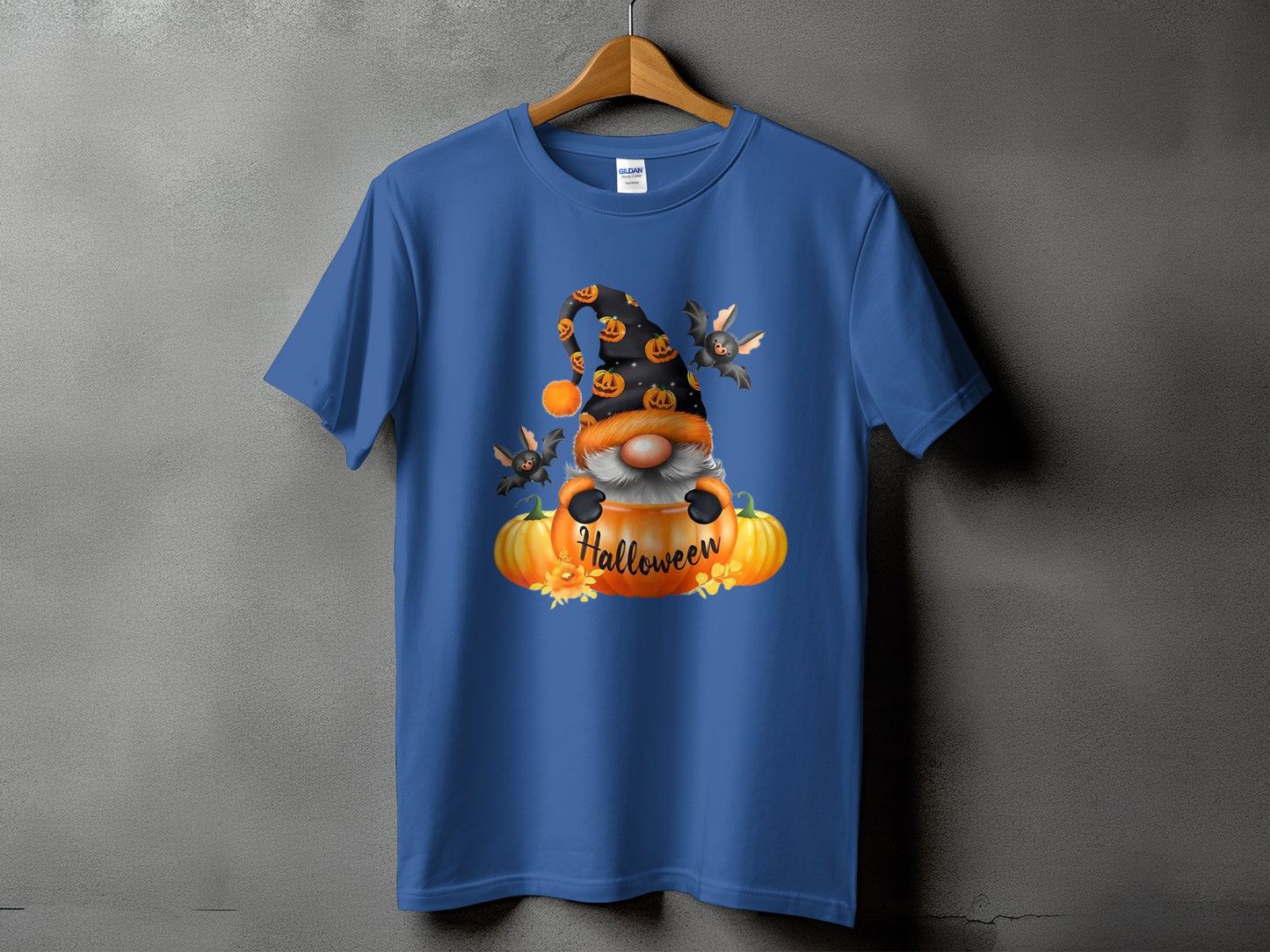 Blue t-shirt with Halloween gnome, pumpkins, bats, and text.