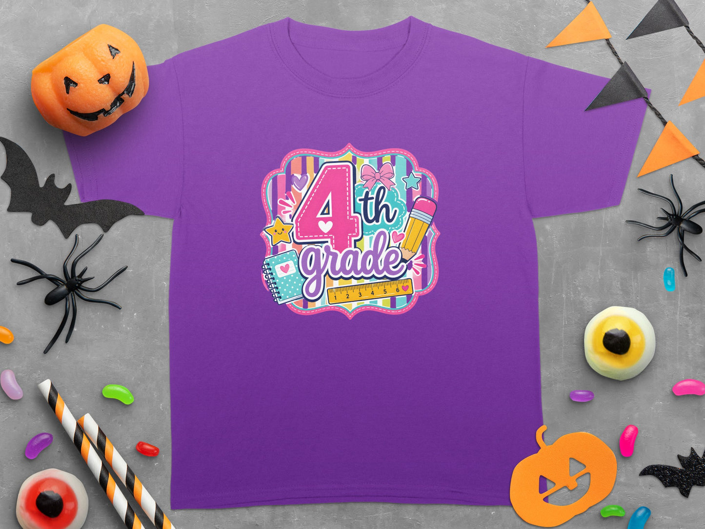 Purple t-shirt with "4th grade" graphic featuring school supplies and Halloween decorations.