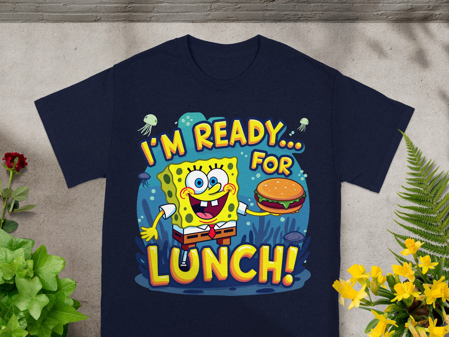 SpongeBob SquarePants holds a burger, saying "I'm Ready... For Lunch!".