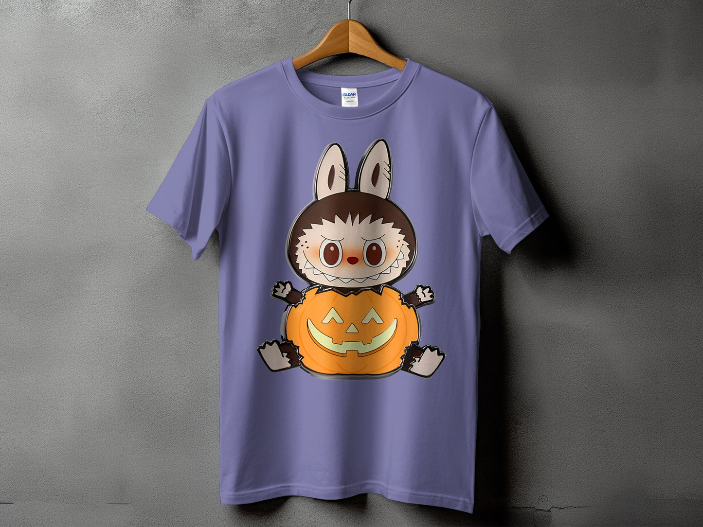 Purple t-shirt with cartoon character sitting in a jack-o'-lantern.