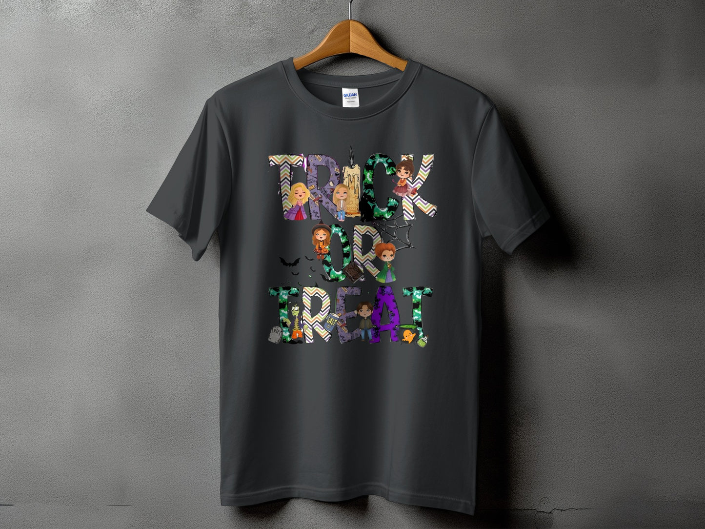 Dark gray t-shirt with "Trick or Treat" text featuring Halloween characters and patterns.