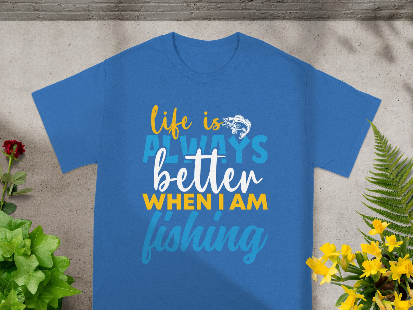 Blue t-shirt with "Life is better when I am fishing" text and fish graphic.