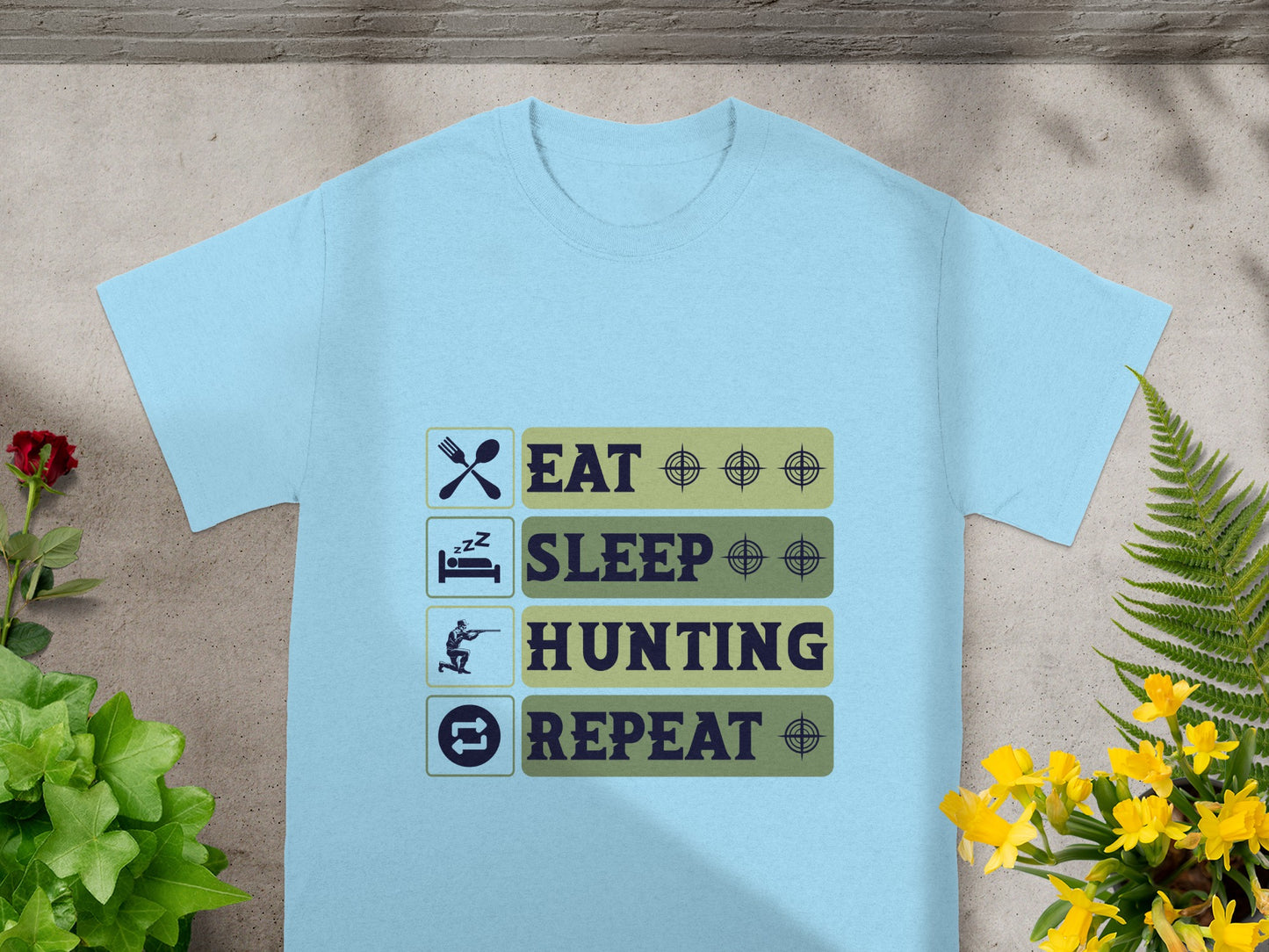 Light blue t-shirt with "Eat, Sleep, Hunting, Repeat" printed in dark blue and green.