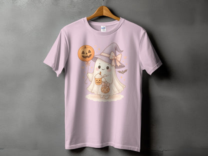 Pink t-shirt with a cute ghost wearing a witch hat holding a pumpkin balloon and a coffee cup.