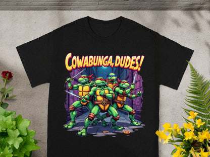 Black t-shirt with Teenage Mutant Ninja Turtles and text that reads "Cowabunga, Dudes!".
