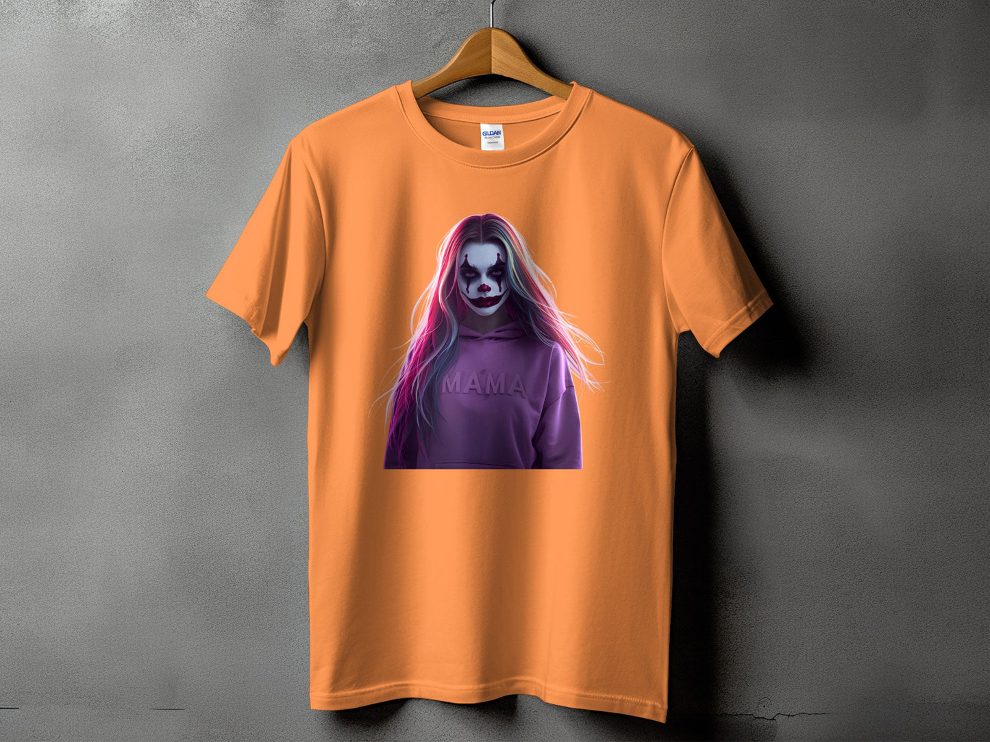 Orange t-shirt with a graphic of a person with clown makeup and "MAMA" text.