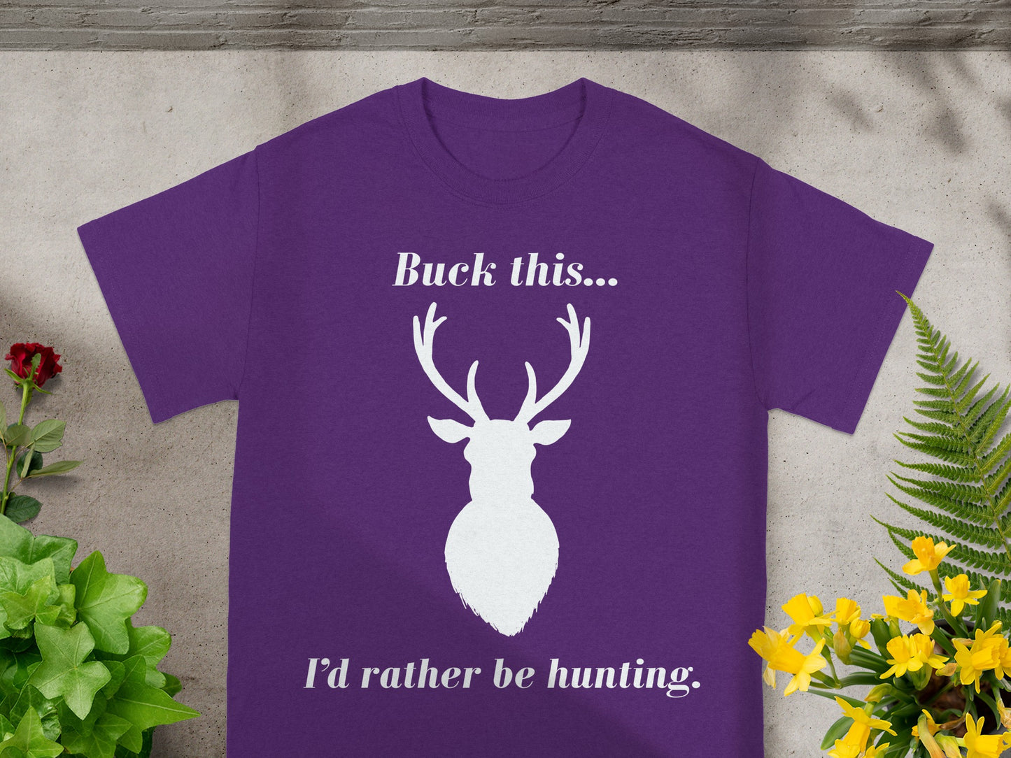 Purple t-shirt with white deer silhouette and text "Buck this... I'd rather be hunting."