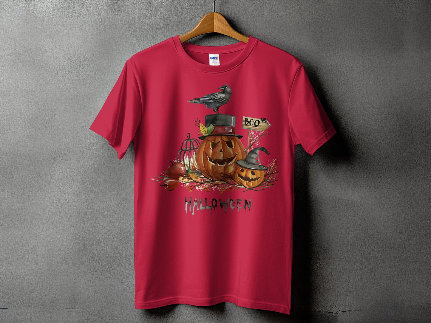 Red t-shirt with Halloween graphic of pumpkins, crow, and the word "HALLOWEEN".