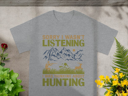 Grey t-shirt with text "Sorry I wasn't listening, I was thinking about hunting."
