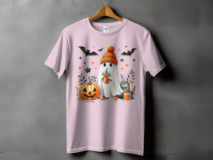 Pink t-shirt with a Halloween graphic of a ghost, pumpkin, bats, and a RIP tombstone.