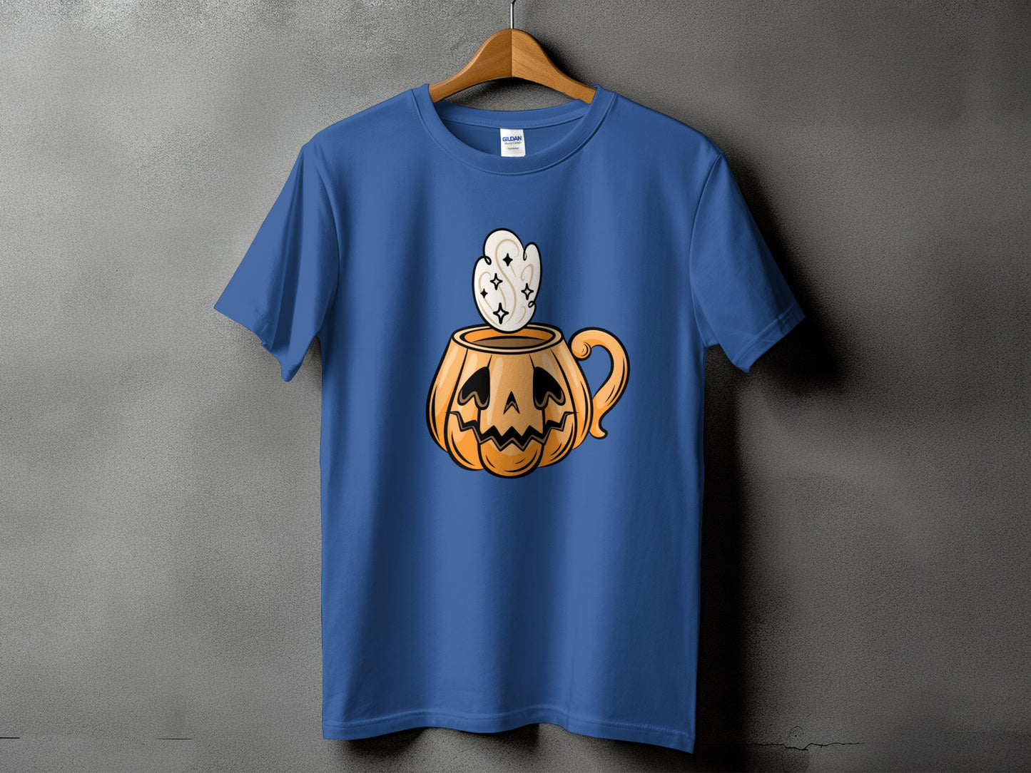Blue t-shirt with a jack-o'-lantern mug and steaming foam graphic.