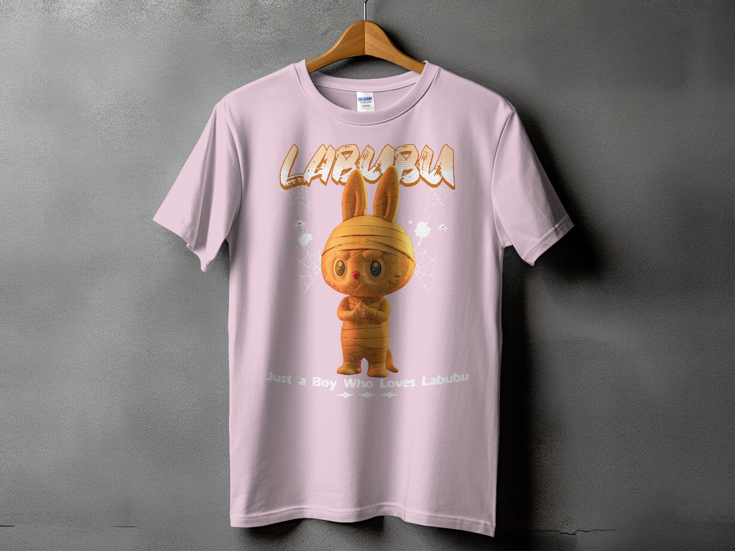 Pink t-shirt with Labubu mummy graphic and text "Just a Boy Who Loves Labubu".