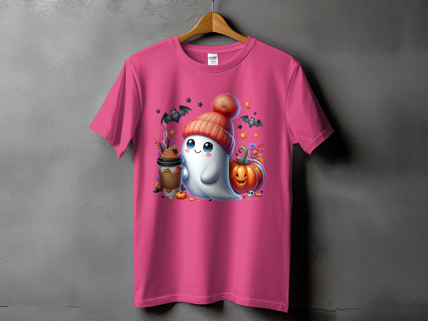Ghost with pumpkin, coffee, bats, and stars on a pink t-shirt.