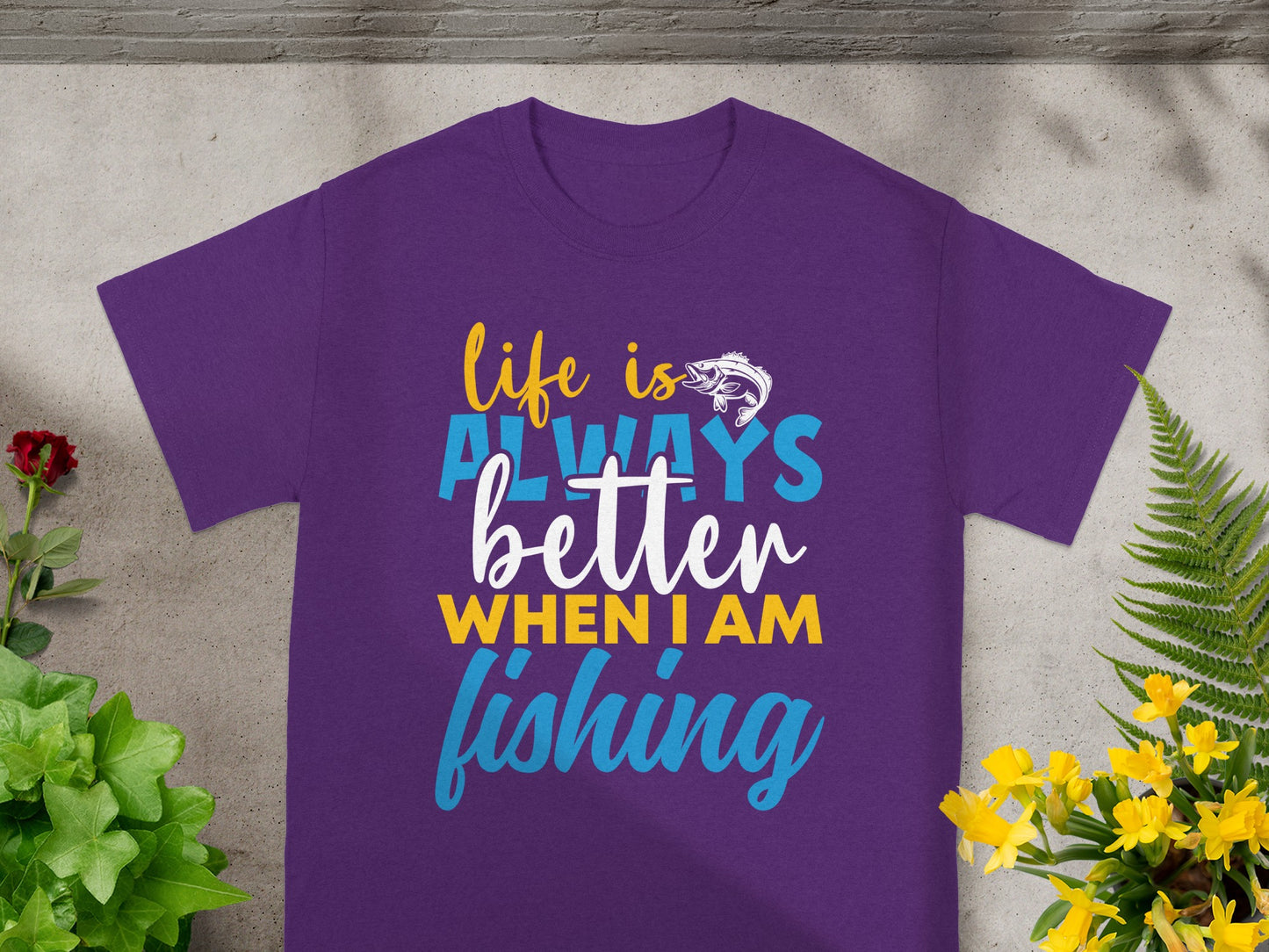 Purple t-shirt with text "life is ALWAYS better WHEN I AM fishing".