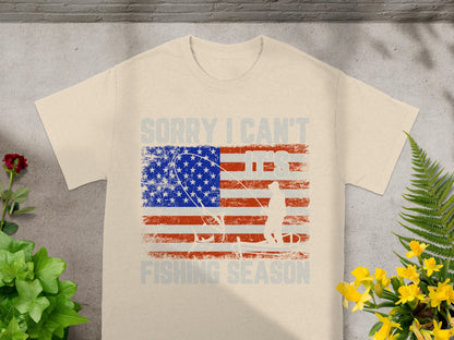 Cream t-shirt with American flag design featuring text "Sorry I Can't, It's Fishing Season."