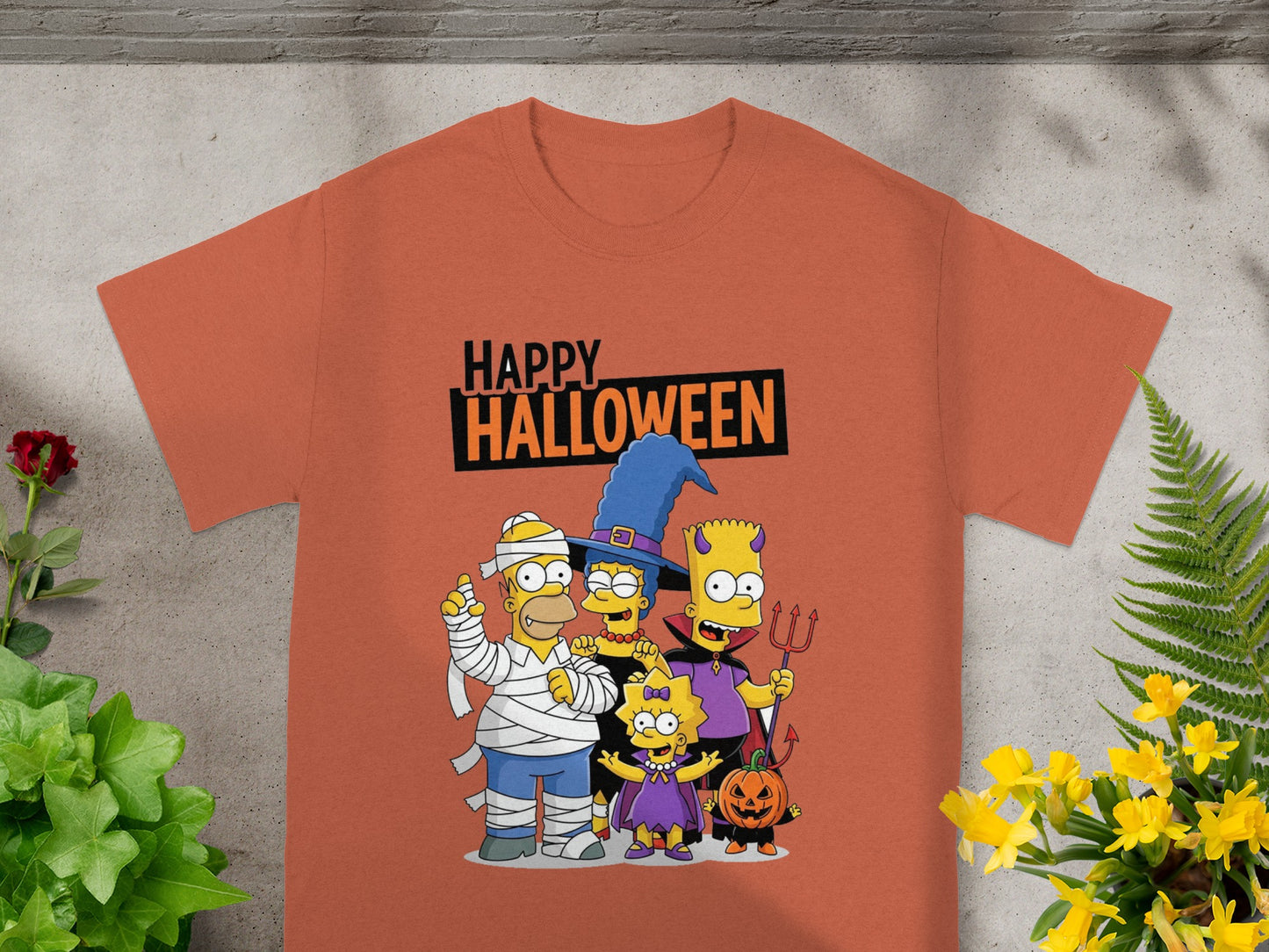 The Simpsons characters in Halloween costumes with "Happy Halloween" text.