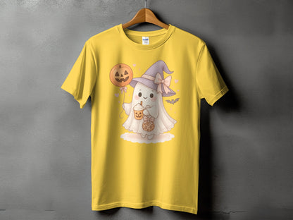 Yellow t-shirt with a cute ghost in a witch hat holding a pumpkin drink.