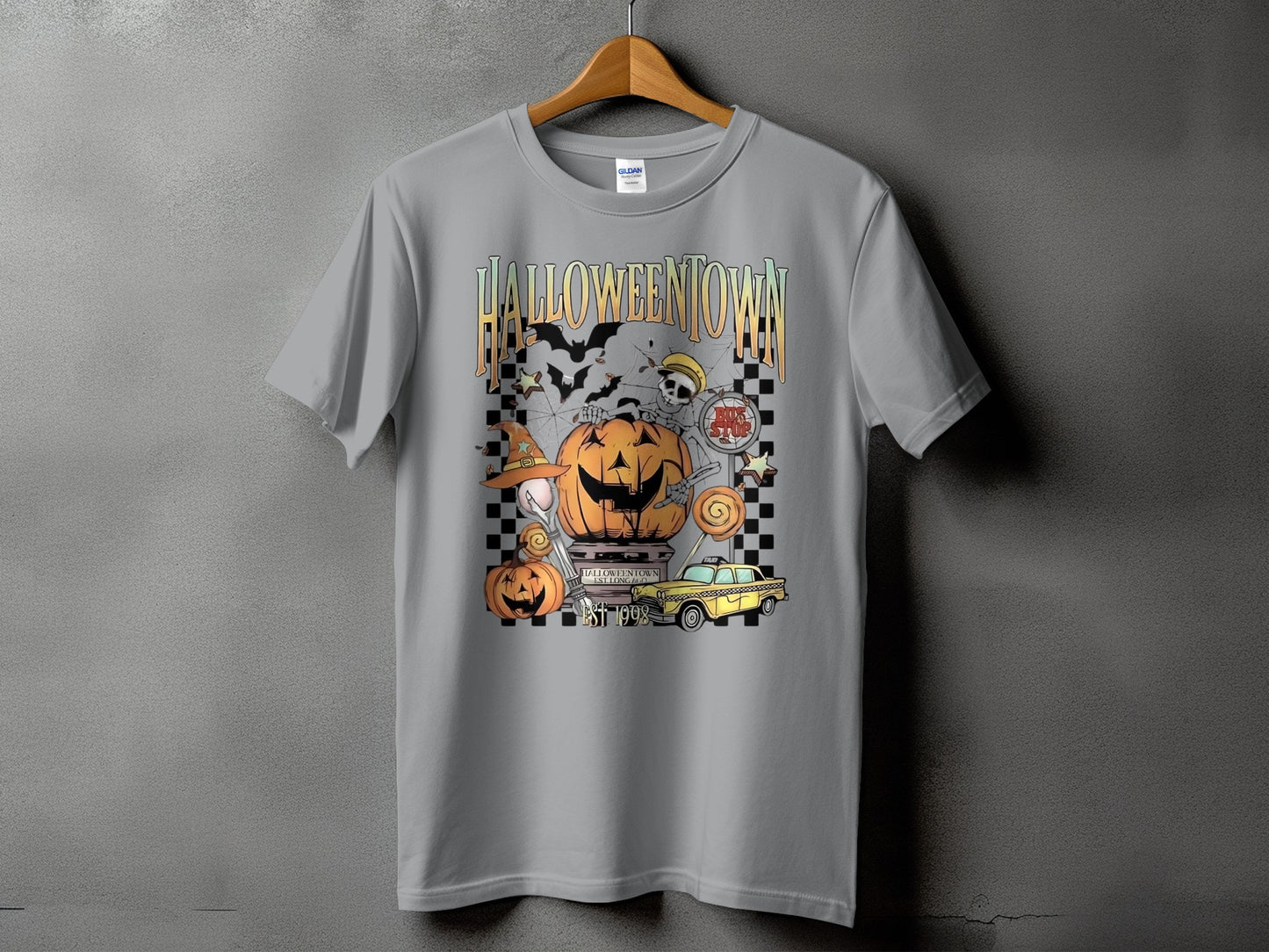 Grey t-shirt with "Halloweentown Est 1998" graphic featuring pumpkins, skeleton, and taxi.
