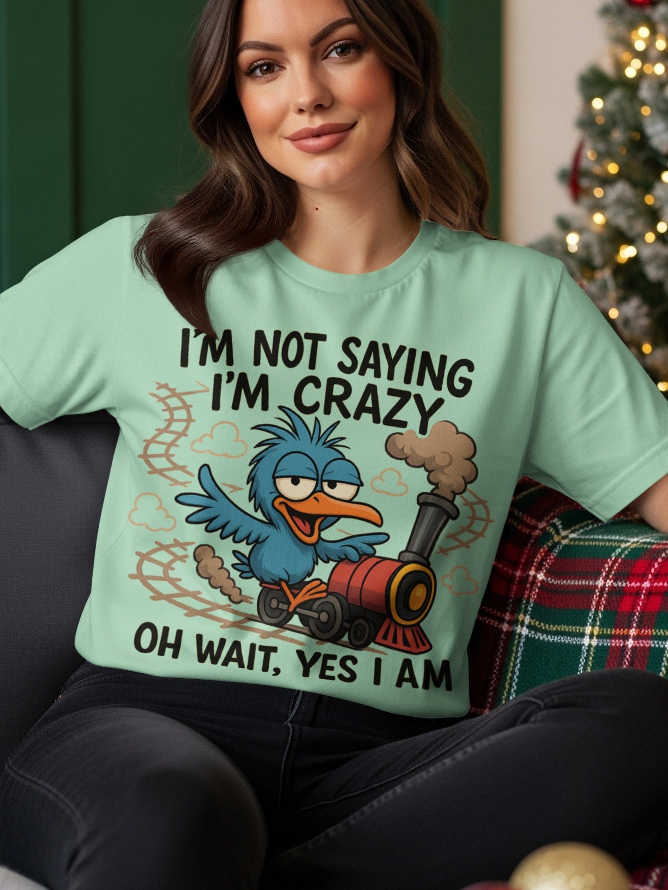 Blue bird on a train with text "I'M NOT SAYING I'M CRAZY OH WAIT, YES I AM".