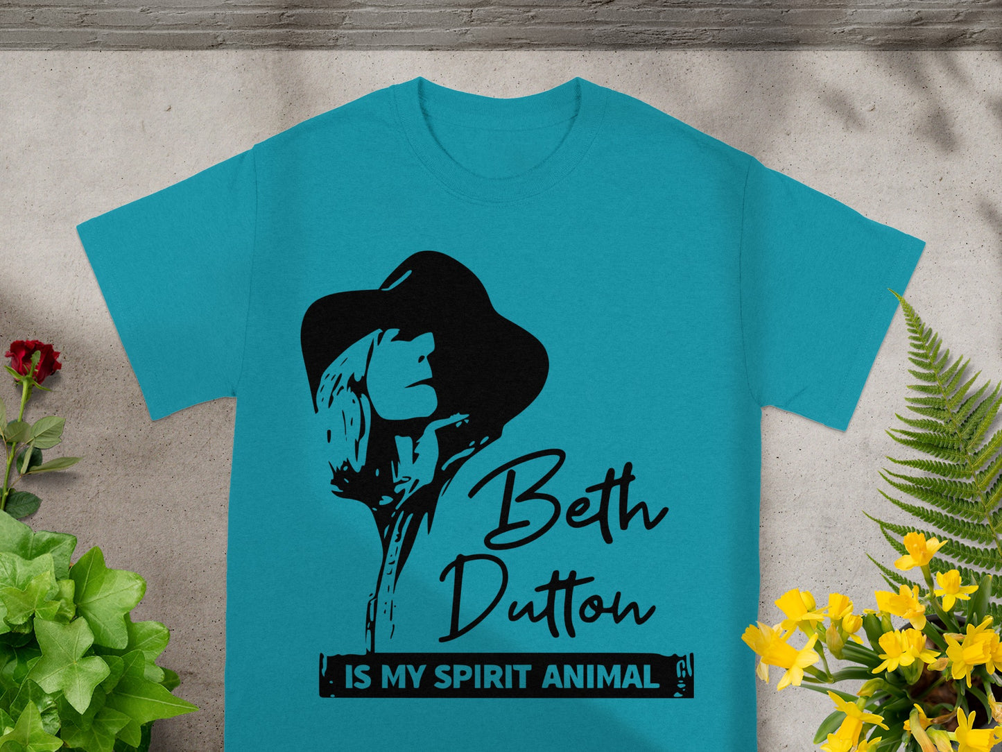 Teal t-shirt with black Beth Dutton graphic and text: "IS MY SPIRIT ANIMAL"