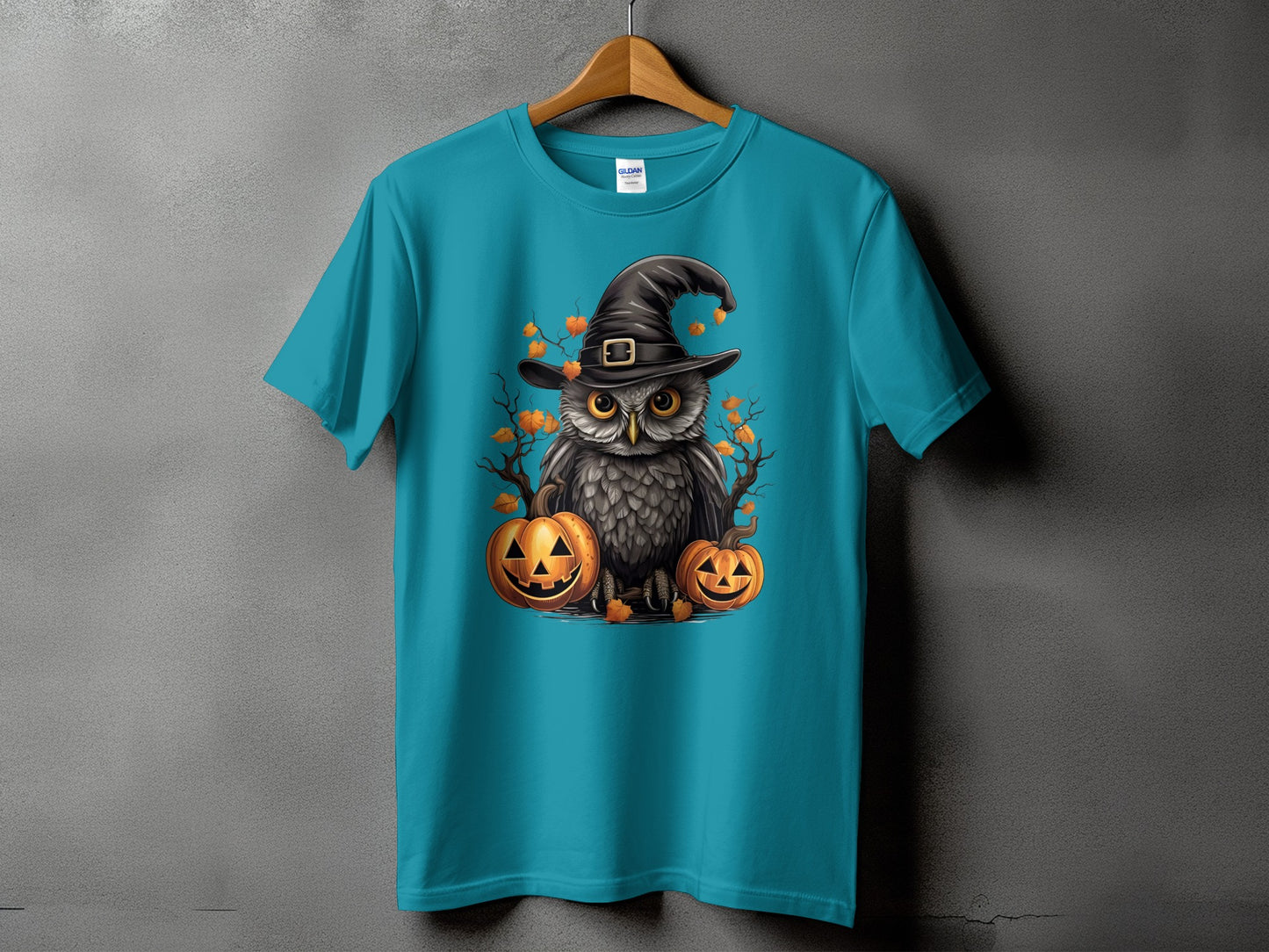T-shirt with Halloween owl in witch hat and pumpkins design.