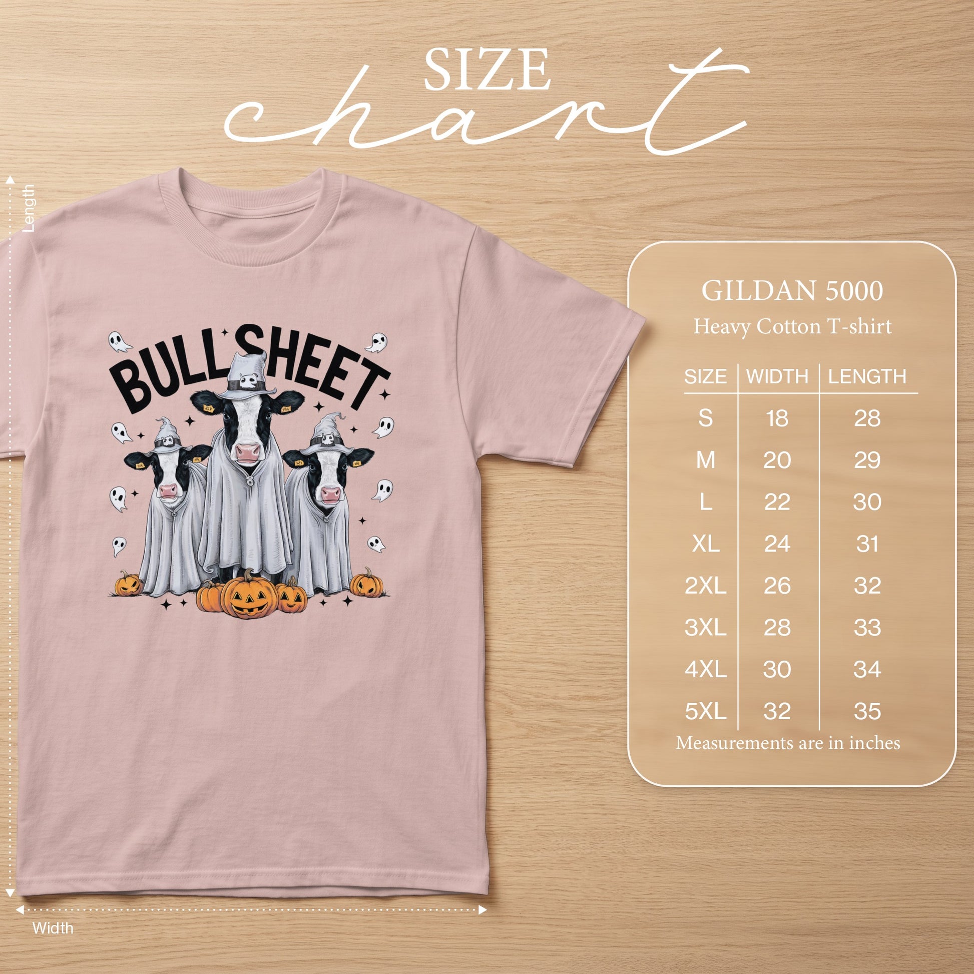 Pink t-shirt with Halloween cows dressed as ghosts and "Bull Sheet" text. Includes size chart.