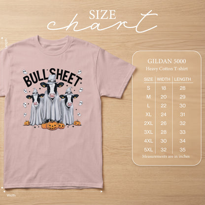 Pink t-shirt with Halloween cows dressed as ghosts and "Bull Sheet" text. Includes size chart.