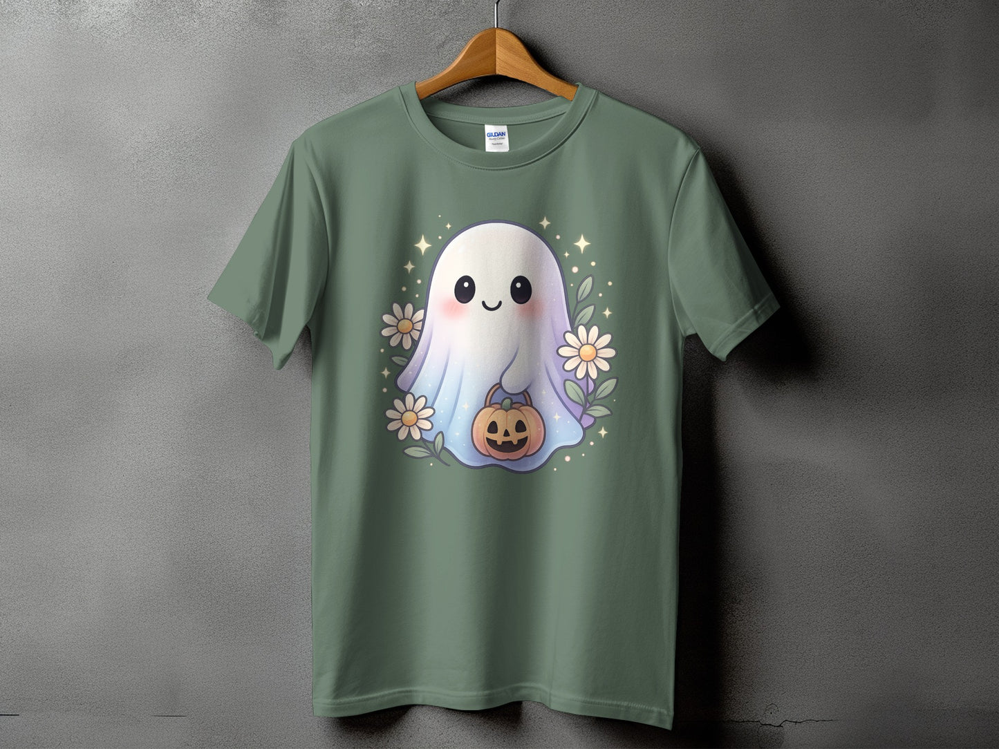 Green t-shirt with a cute ghost holding a pumpkin surrounded by flowers.