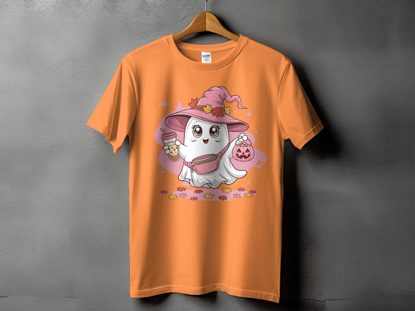 Orange t-shirt with a cute ghost wearing a pink witch hat and holding a bubble tea and pumpkin.