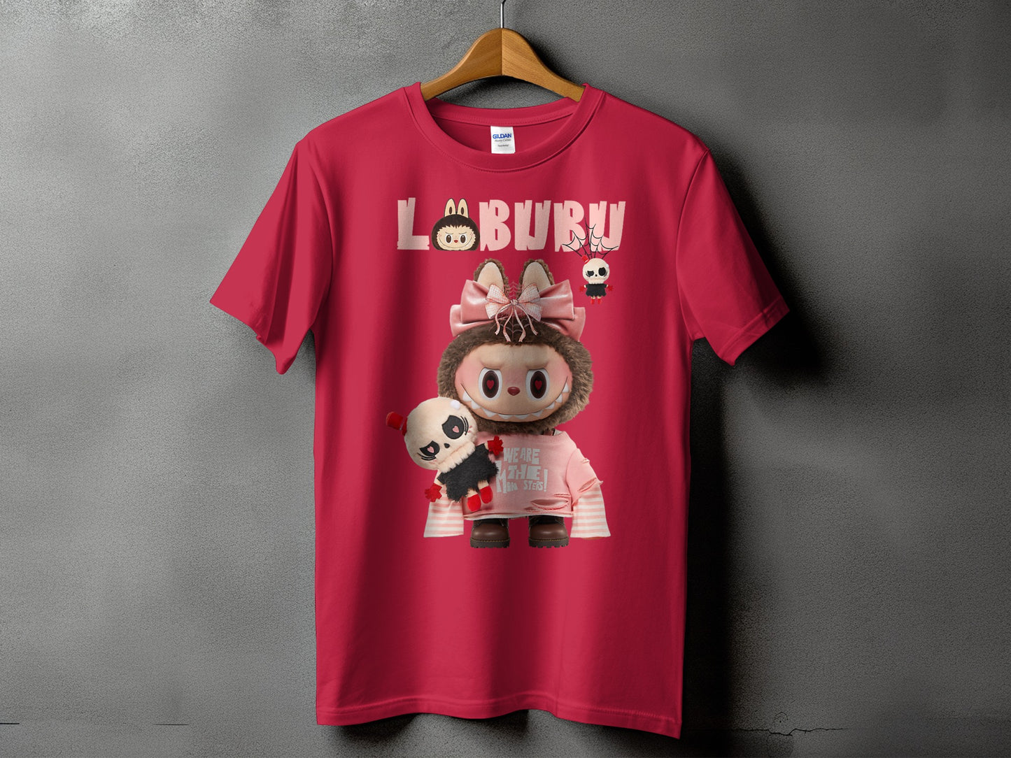 Red t-shirt with "LABURU" text and characters, one holding a panda plush.