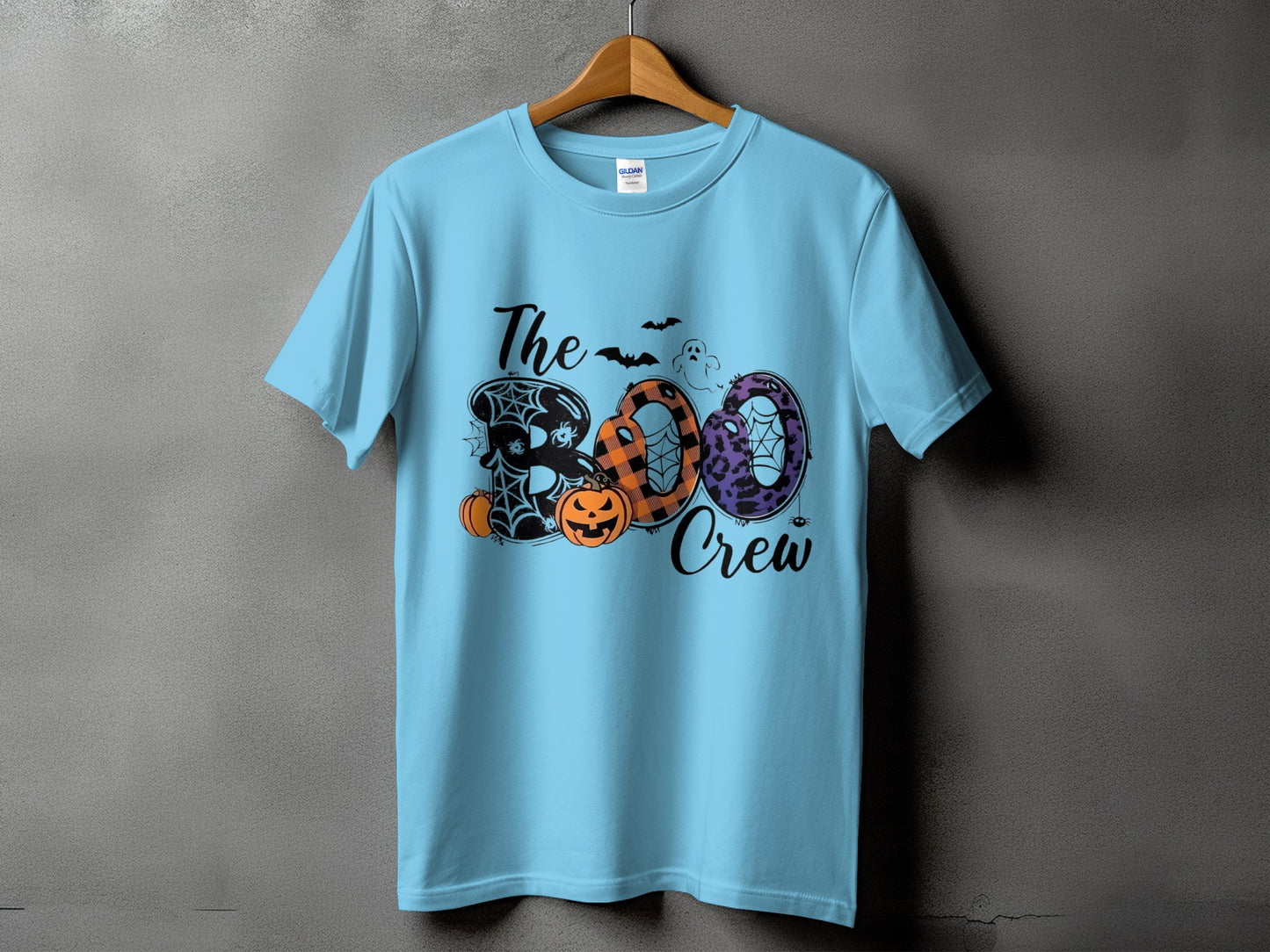 Light blue t-shirt with "The Boo Crew" Halloween graphic featuring pumpkins and bats.