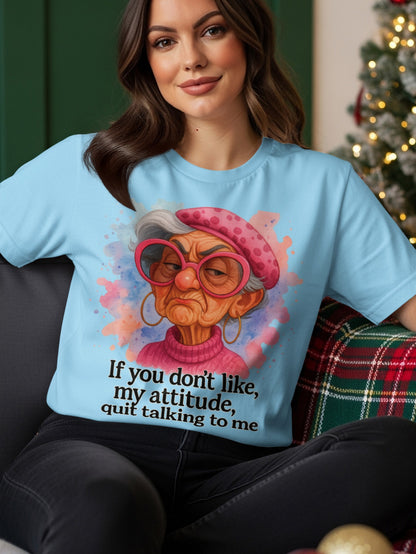Light blue t-shirt with a cartoon of an elderly woman and the text "If you don't like my attitude, quit talking to me."
