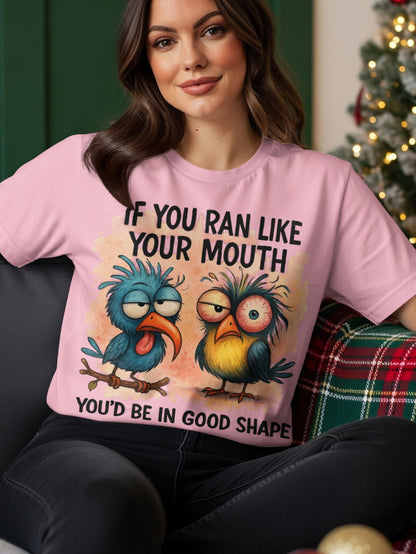 Pink t-shirt with cartoon birds and the text "If you ran like your mouth you'd be in good shape".