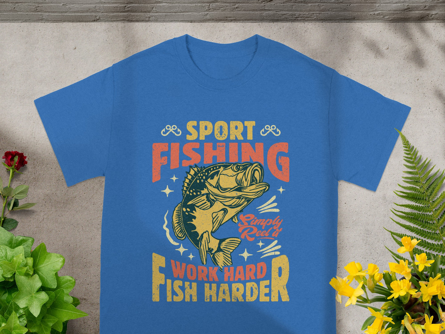 Blue t-shirt with "SPORT FISHING" text, a bass fish graphic, and "Work Hard Fish Harder."