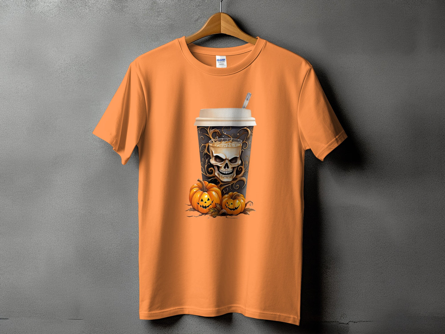 Orange t-shirt with Halloween skull coffee cup and pumpkins graphic.