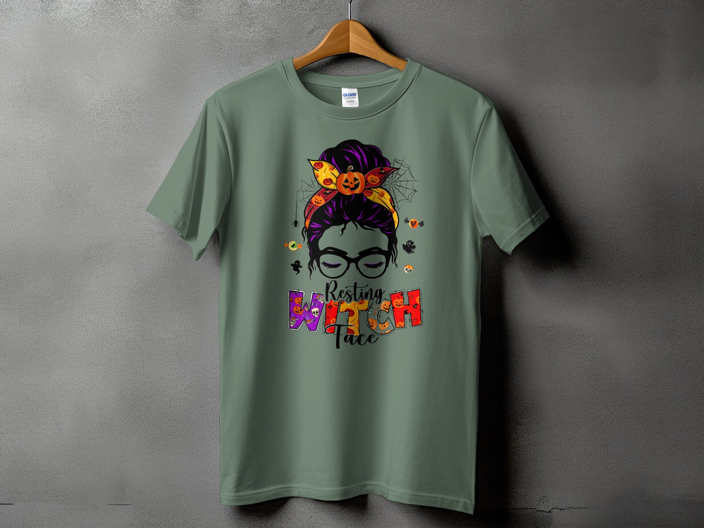 Green t-shirt with "Resting Witch Face" Halloween graphic.