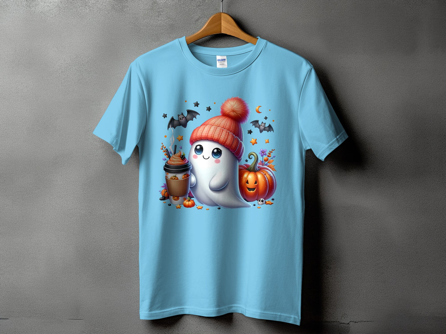 Light blue t-shirt with ghost, coffee, and pumpkins Halloween graphic.