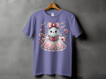 Purple t-shirt with a cute ghost reading a book surrounded by flowers and bats.