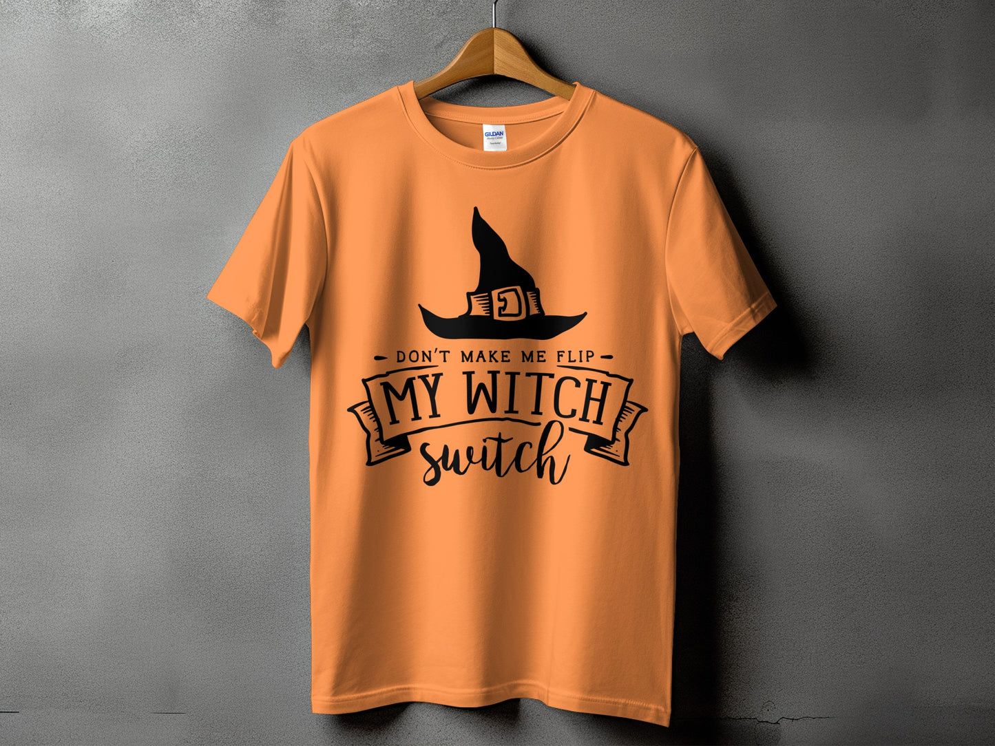 Orange t-shirt with a witch hat and "My Witch Switch" text design.