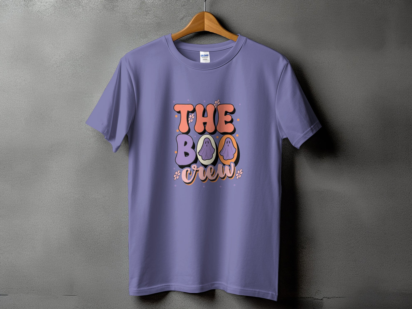 Purple t-shirt with "The Boo Crew" text and ghost graphics.