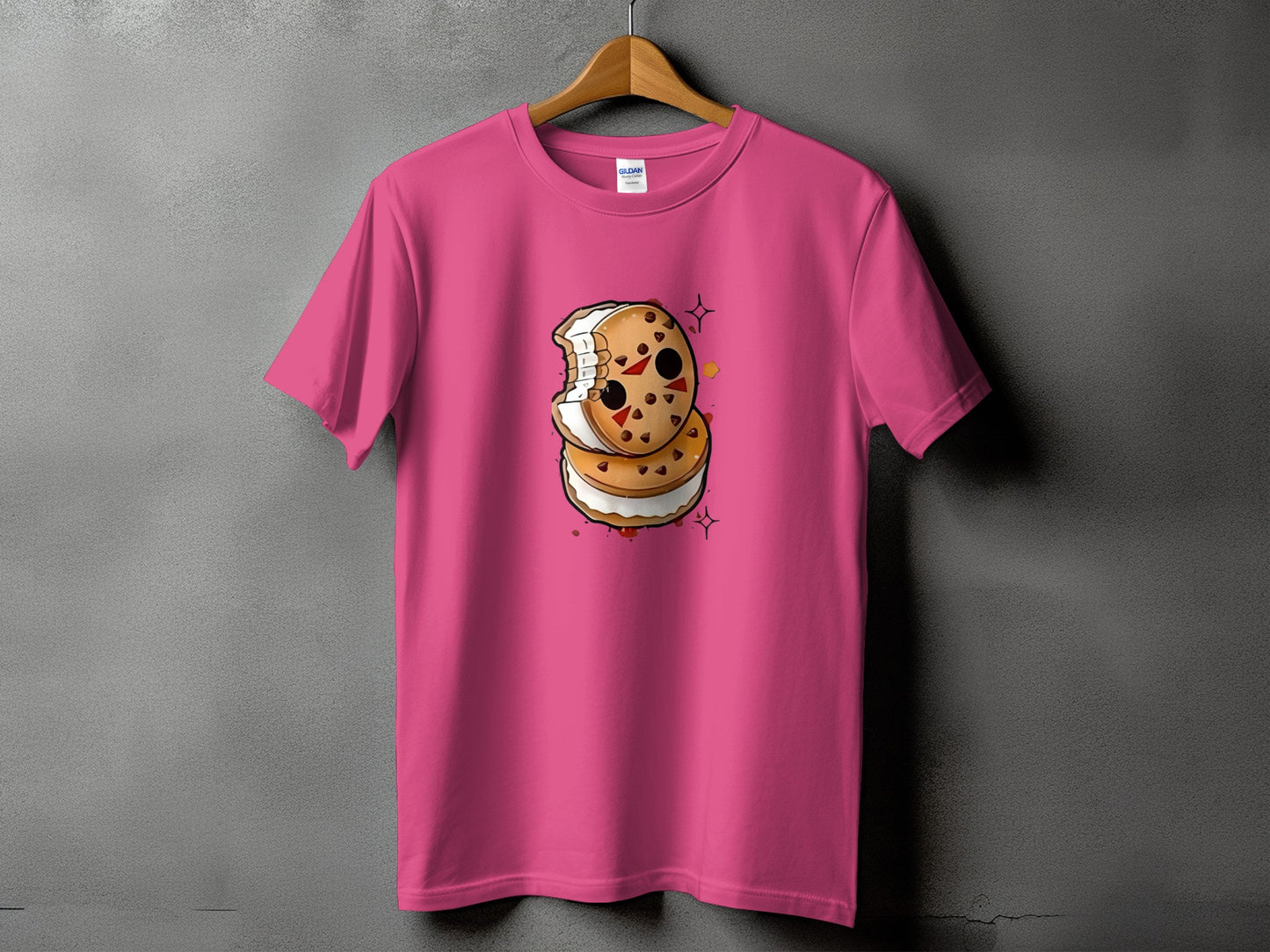 Pink t-shirt with a cartoon ice cream sandwich graphic wearing a hockey mask.