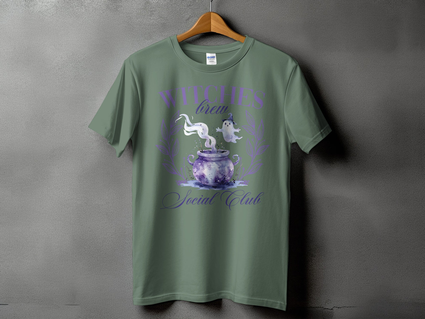 Green t-shirt with "Witches Brew Social Club" text and Halloween graphics.
