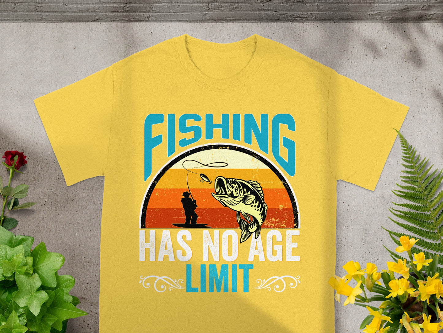 Yellow t-shirt graphic with "FISHING HAS NO AGE LIMIT" and a bass jumping.