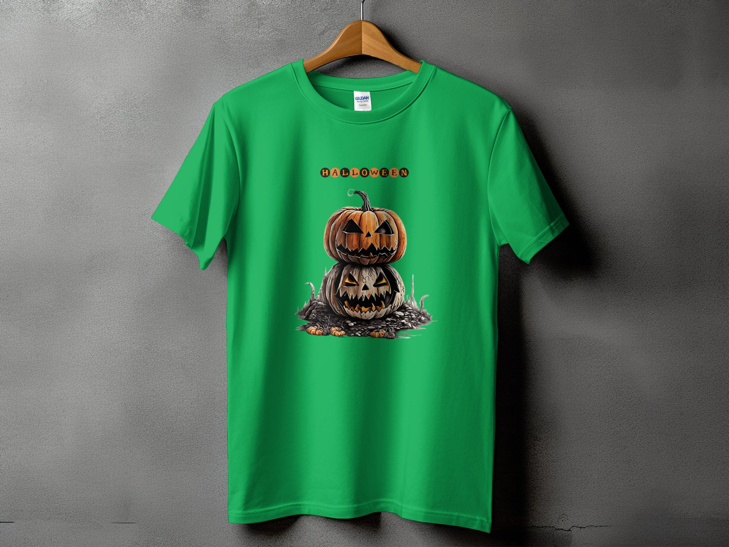 Green t-shirt with stacked Halloween pumpkins graphic and "HALLOWEEN" text.