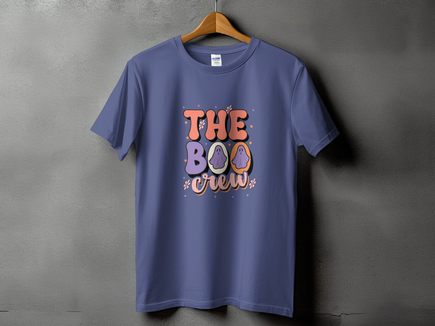 Purple t-shirt with "The Boo Crew" text and ghost graphics.
