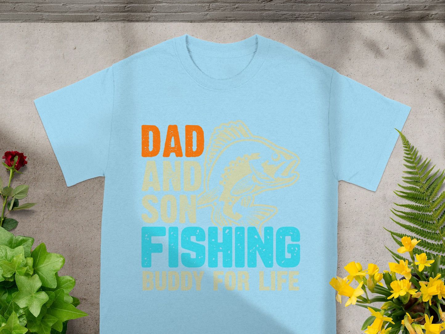 Light blue t-shirt with "Dad and Son Fishing Buddy for Life" text and fish graphic.