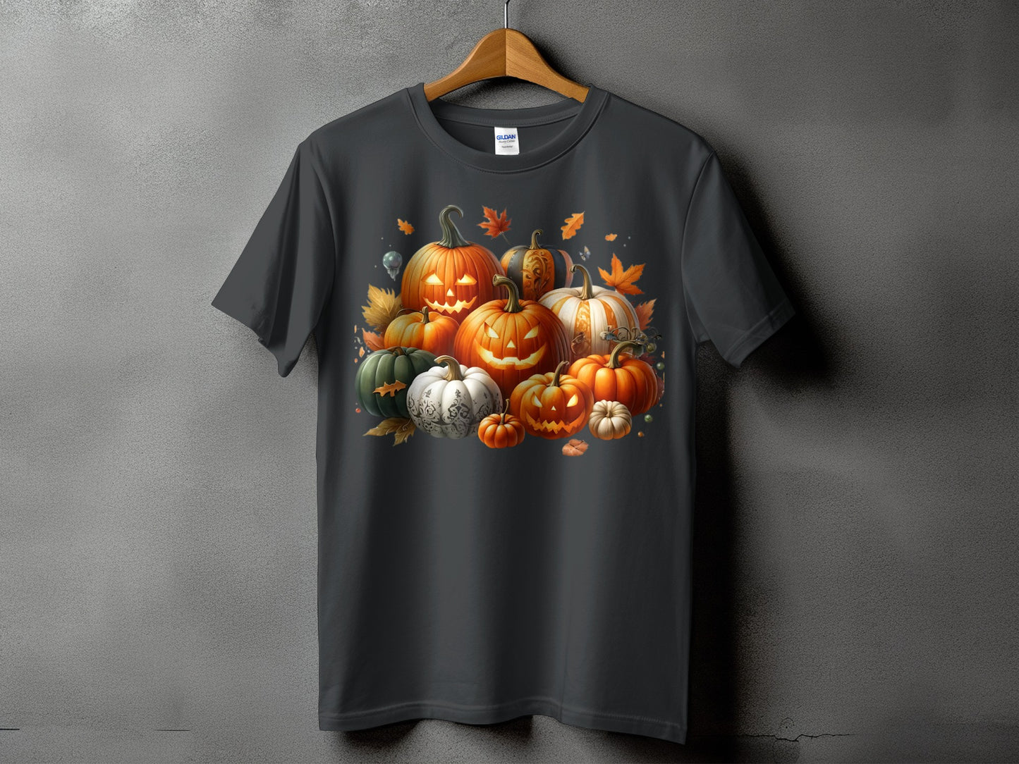Dark grey t-shirt with carved jack-o'-lanterns and autumn leaves graphic.