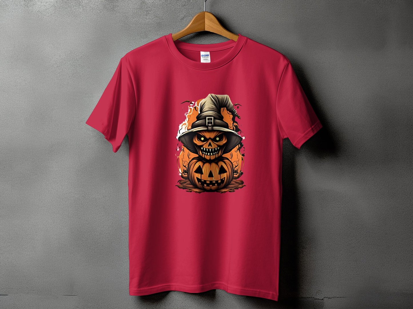 Red t-shirt with spooky jack-o'-lantern and witch hat Halloween graphic.